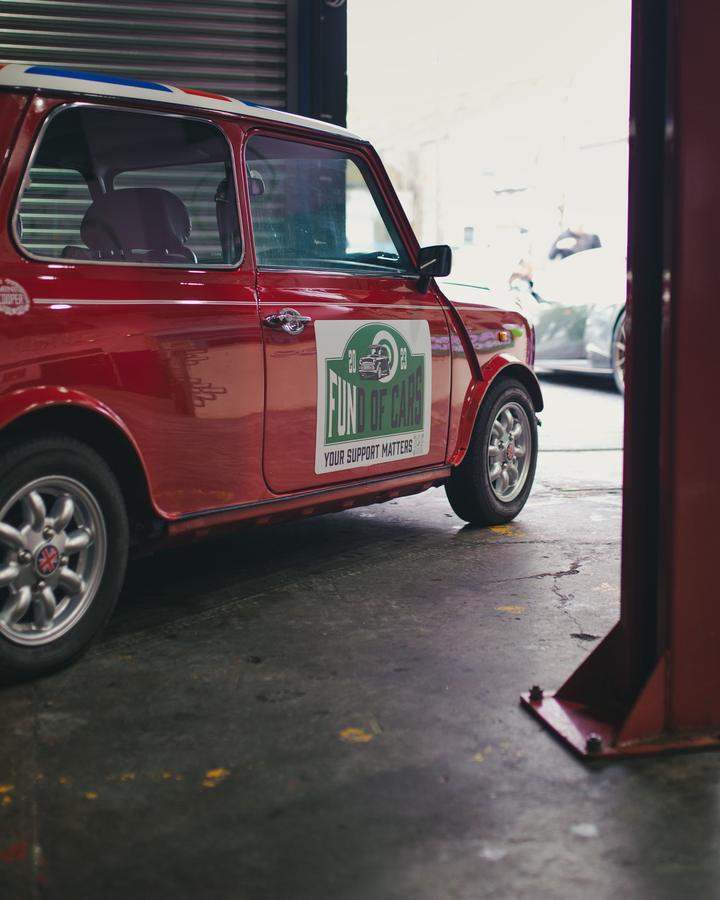 Classic Mini wearing the Fund of Cars 2023 rally plate